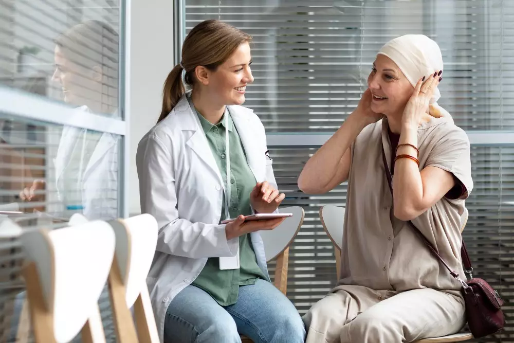 middle-aged-woman-with-skin-cancer-talking-with-her-doctor-1.jpg